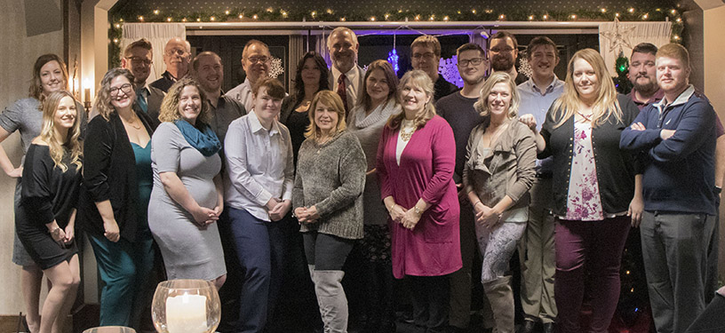 A photo of the Online Access staff at a company christmas party.